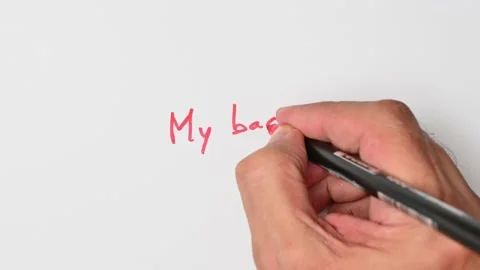 Writing with a red marker the sentence: My bad Stock Footage 221782256