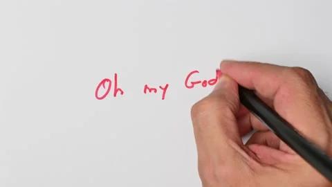 Writing with a red marker the sentence: Oh my God! Stock Footage 221781933