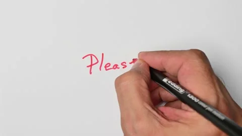 Writing with a red marker the sentence: Please Stock Footage 221780857