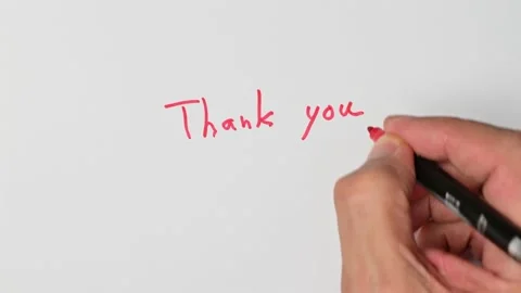 Writing with a red marker the sentence: Thank you Stock Footage 221780863