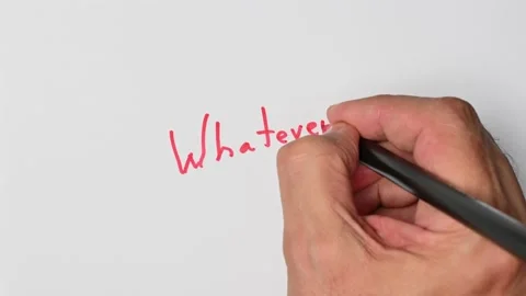 Writing with a red marker the sentence: Whatever Stock Footage 221781932