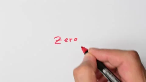Writing with a red marker the sentence: Zero Stock Footage 221783861