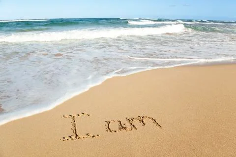 Writing in sand 写真素材