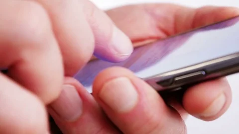 Writing sms on mobile phone 4K Video stock 71003671