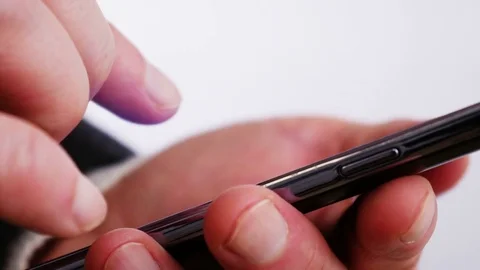 Writing sms on mobile phone 4K Video stock 71004206