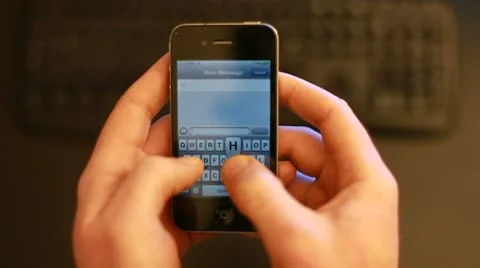 Writing sms on the smartphone Stock Footage 10735260