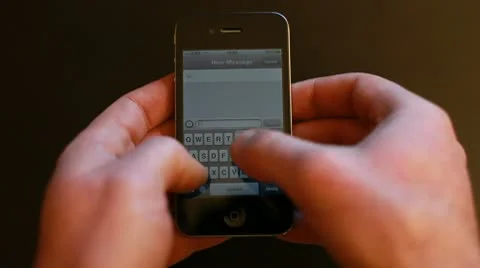 Writing sms on the smartphone Stock Footage 10735274