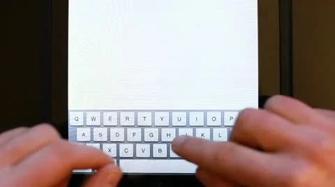 Writing sms on the tablet Stock Footage 10735175