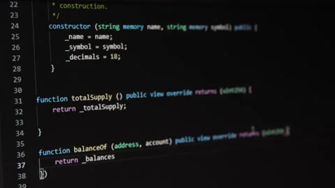 Writing solidity code for Ethereum smart contract 库存影片 153814452