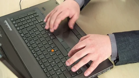 Writing something on the keyboard of a computer Stock Footage 75440086