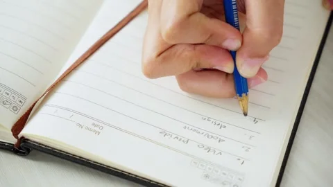 Writing Study Notes in a Notebook With Pen 스톡 동영상 347626391