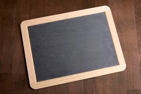 Writing tablet on a brown background Stock Photos