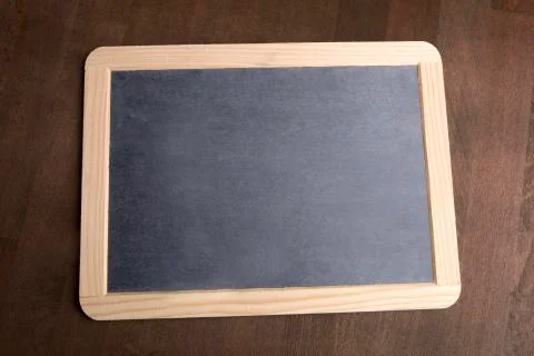 Writing tablet on a brown background Foto stock