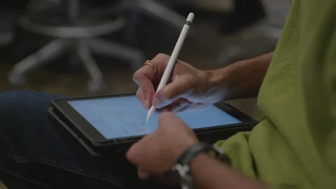 Writing on Tablet with a Stylus Stock Footage 147360037