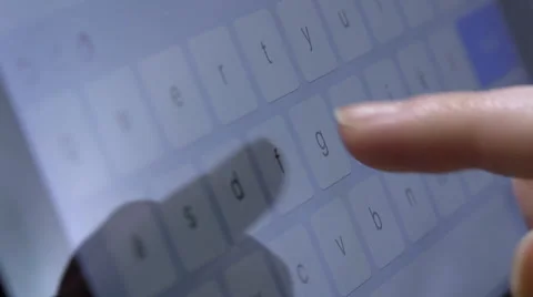 Writing a text: typing a message on the touchscreen of a tablet computer Stock-Footage 60575199