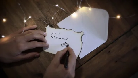Writing "Thank You" in Calligraphy - Version 2 (Aged Paper) Stock Footage 83018519
