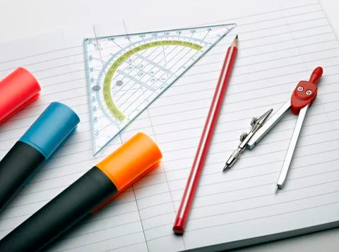 Writing tools and compass Stock Photos