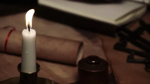 Writing In Vintage Journal with Candle Stock Footage 282443604