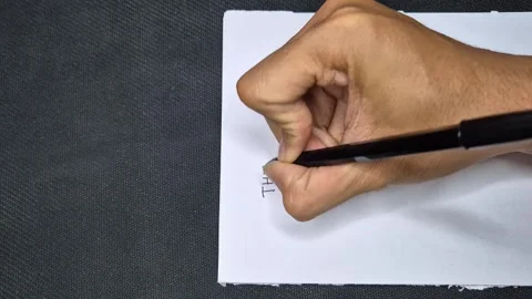 Writing on a white paper Stock Footage 297546544