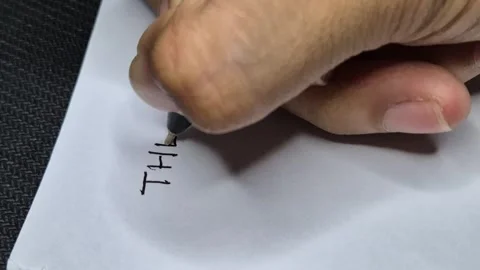 Writing on a white paper Stock Footage 297546562