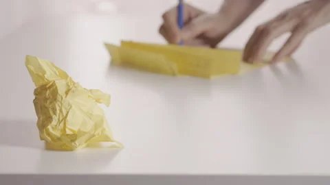 Writing  on yellow  letter or document Stock Footage 345695970