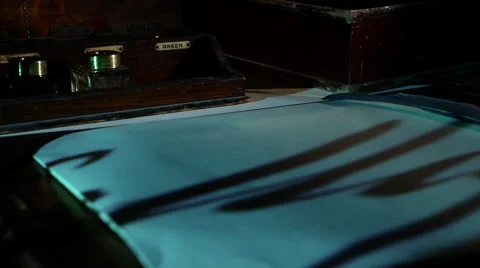 Writng ink pots on desk projected image jib 1 Stock Footage 47451671