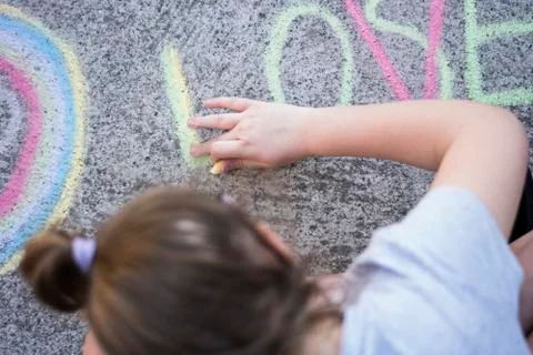 Written with chalks on a colored road Stock Photos