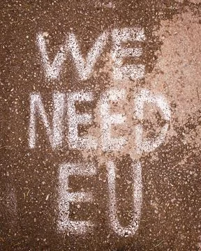 Written statement on the ground "we need EU". Integration process to EU conce Fotos de archivo