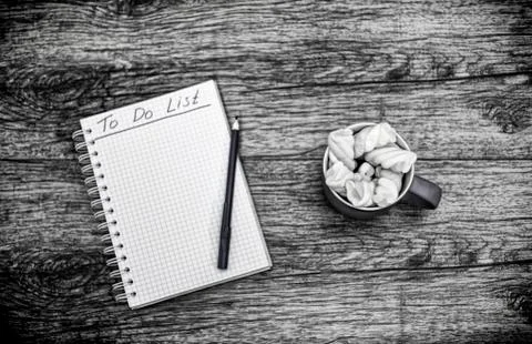 Written the text: To Do List with cup of marshmallows. Stock Photos
