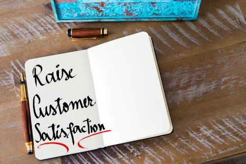 Written text Raise Customer Satisfaction Stock Photos