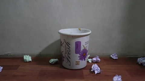 Writter, businessman, student throwing crumpled paper in the trash bin Stock Footage 246491979