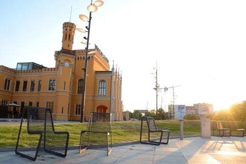 Wroclaw, Poland - June 6, 2015: Iron chairs and lantern at main railway stati Stock Photos
