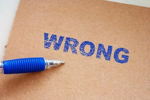 Wrong error text. Mistake concept background. Inscription WRONG Stock Photos