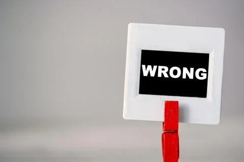 Wrong error text. Mistake concept background. Inscription WRONG Stock Photos