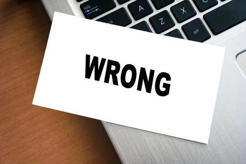 Wrong error text. Mistake concept background. Inscription WRONG Stock Photos