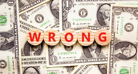 Wrong symbol. Concept word Wrong on beautiful wooden circles. Beautiful dolla Stock Photos