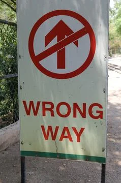 Wrong Way Sign Board Stock Photos