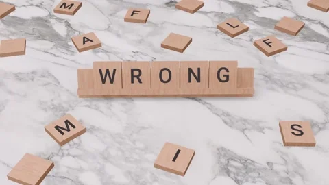 WRONG word written on scrabble Stock Footage 256875315