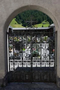 Wrought iron gate of a small cemetery Foto stock
