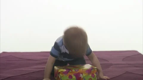 WS Boy (4-5) opening birthday gift Stock Footage 11339562