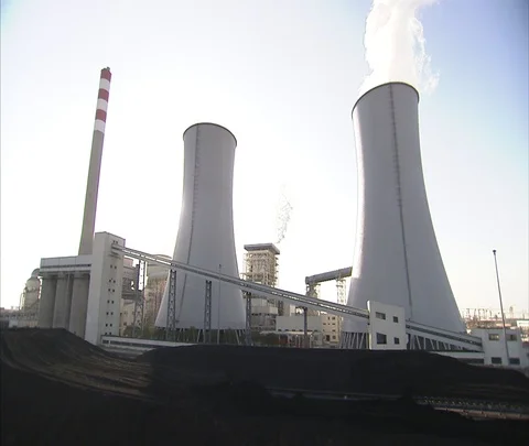 WS coal pile in front of cooling towers at Shenhua Sanhe power station. Stock Footage 86746707