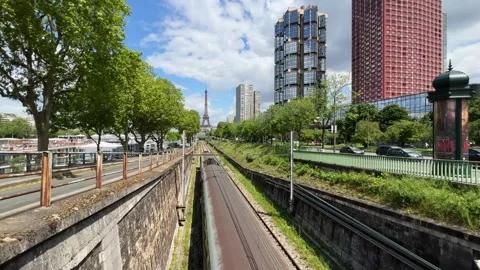WS Commuter train and high rise buildings in Beaugrenelle district, Paris, Stock Footage 246921666