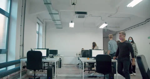 WS DS Office workers wearing face masks during pandemic Stock-Footage 145146136