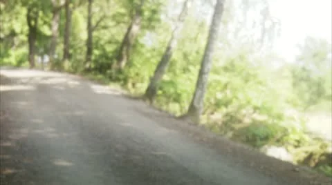 WS Friends walking with bikes down dirt road Stock Footage 11342568