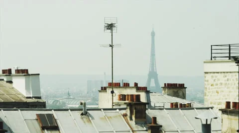 WS HA LS Eiffel Tower over rooftops / Montmartre, Paris, France Vídeo Stock 33844523