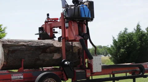 WS large log on portable sawmill Stock Footage 40472427