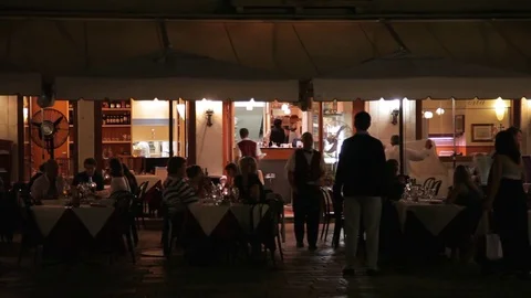 WS LD Busy Restaurant at Night / Venice, Italy Stock Footage 69963014