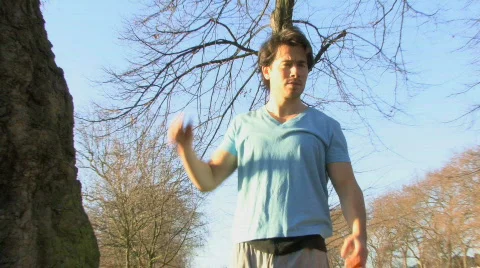 WS OF A MAN WARMING UP Stock Footage 544172