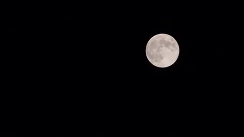 WS Moon against a night sky (right) Stock Footage 137809253