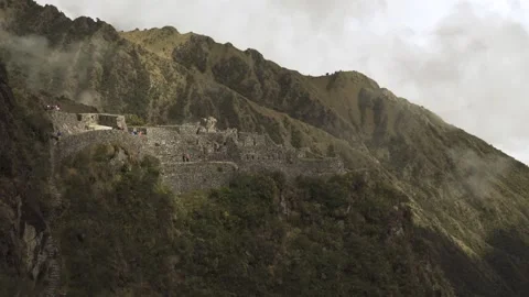 WS mountains and stone structure on Inca trail to Machu Picchu Video stock 130457159